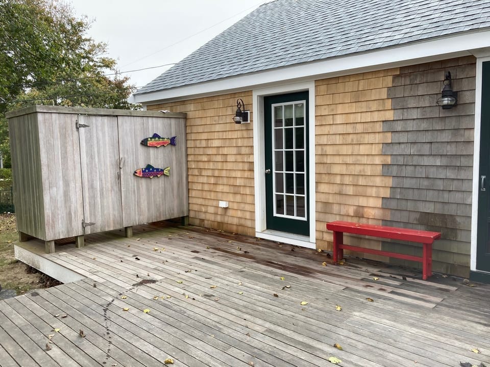 Enlarged deck with fabulous outdoor shower.