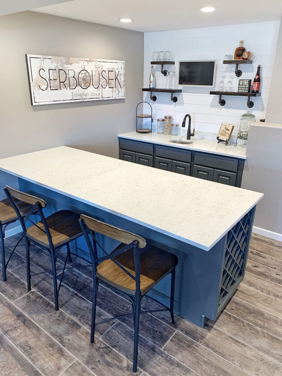Lower level bar/entertaining space. 