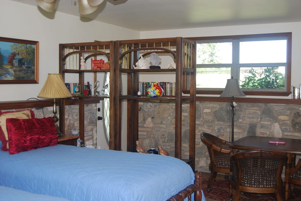downstairs guest bedroom and game table