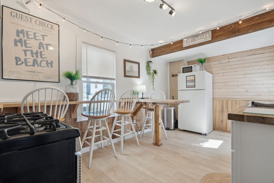 Front cottage fully renovated (spring 2022) eat-in kitchen with butcher block countertops.