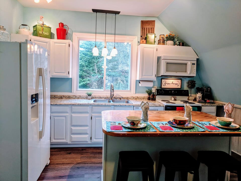 Fully-equipped kitchen with barn house style