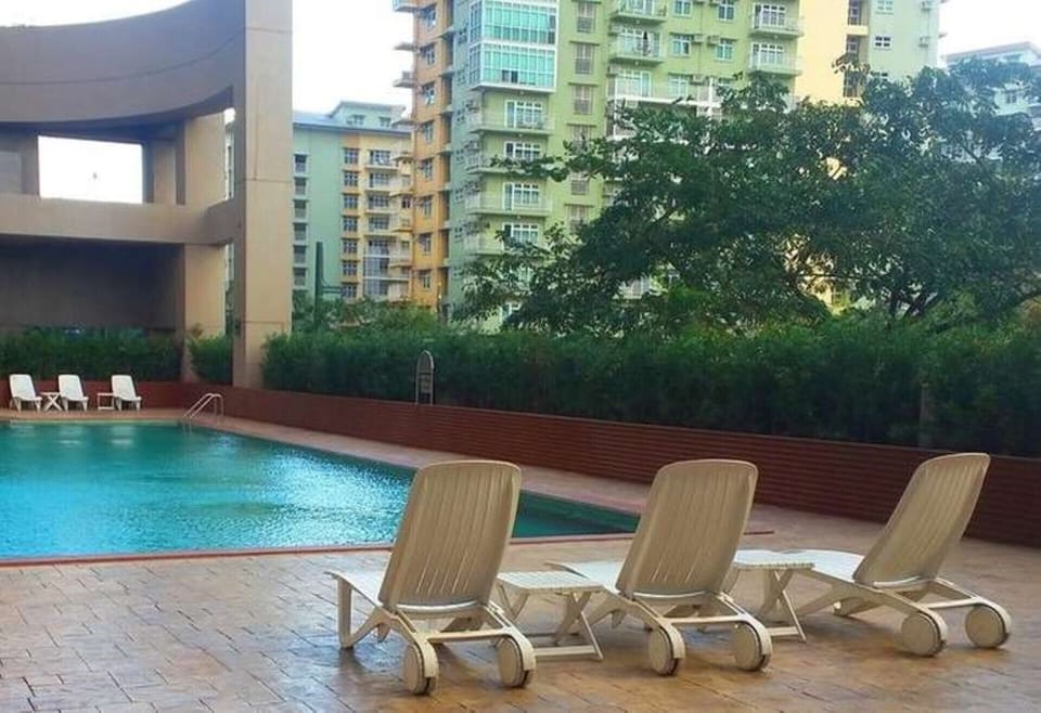 Inviting pool with kiddie pool and shower