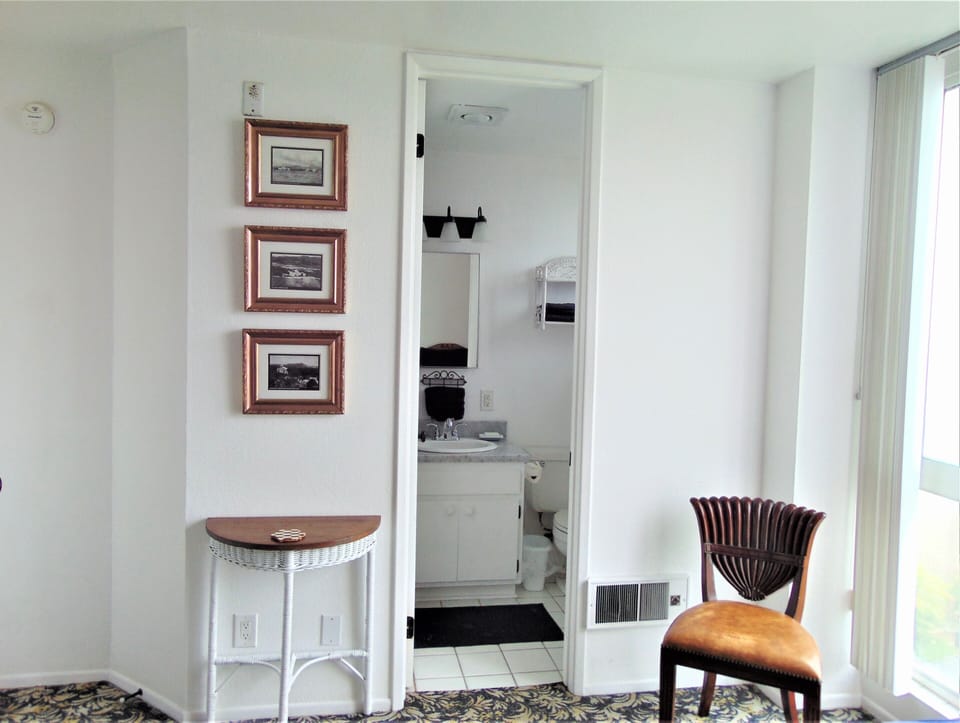 Second bedroom. Window to right views beach, ocean, estuary, Harbor Village.