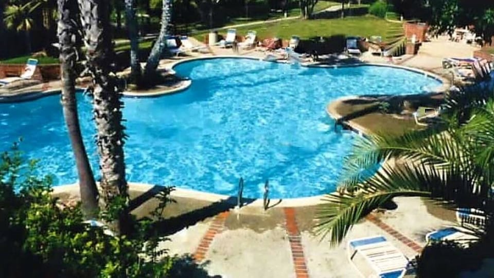 Large pool area with spa,restrooms; on other side of our ocean view condo.