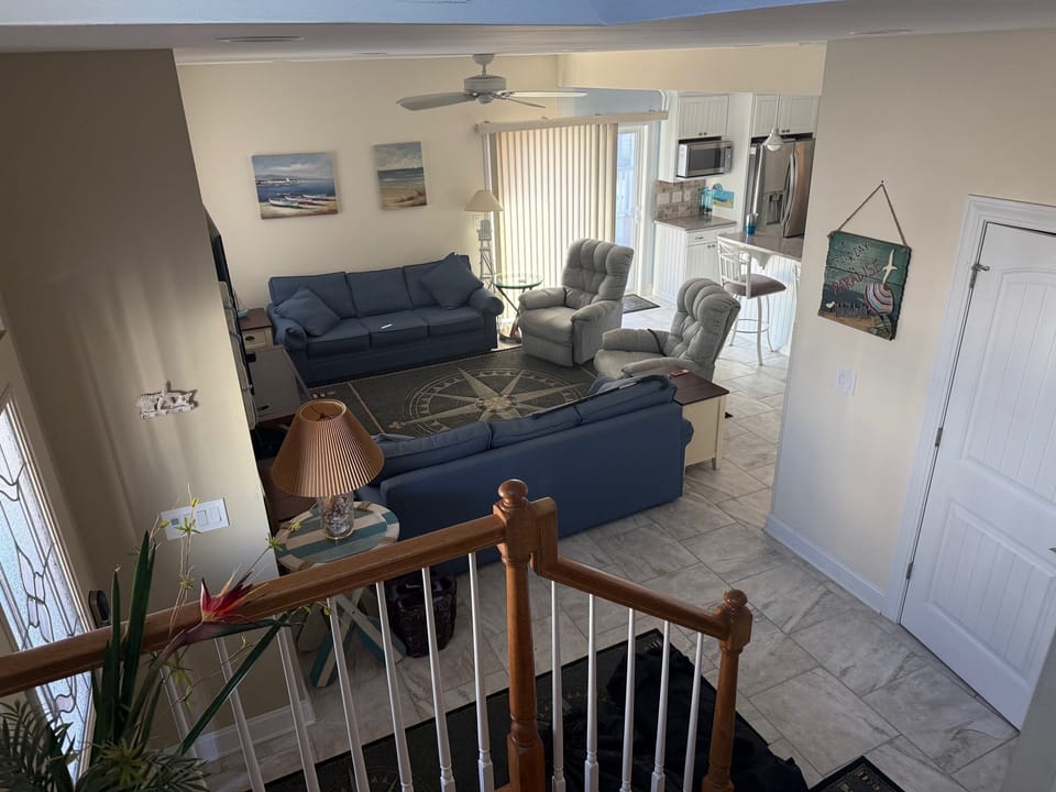 Living Room view from stairs to 2nd Fl