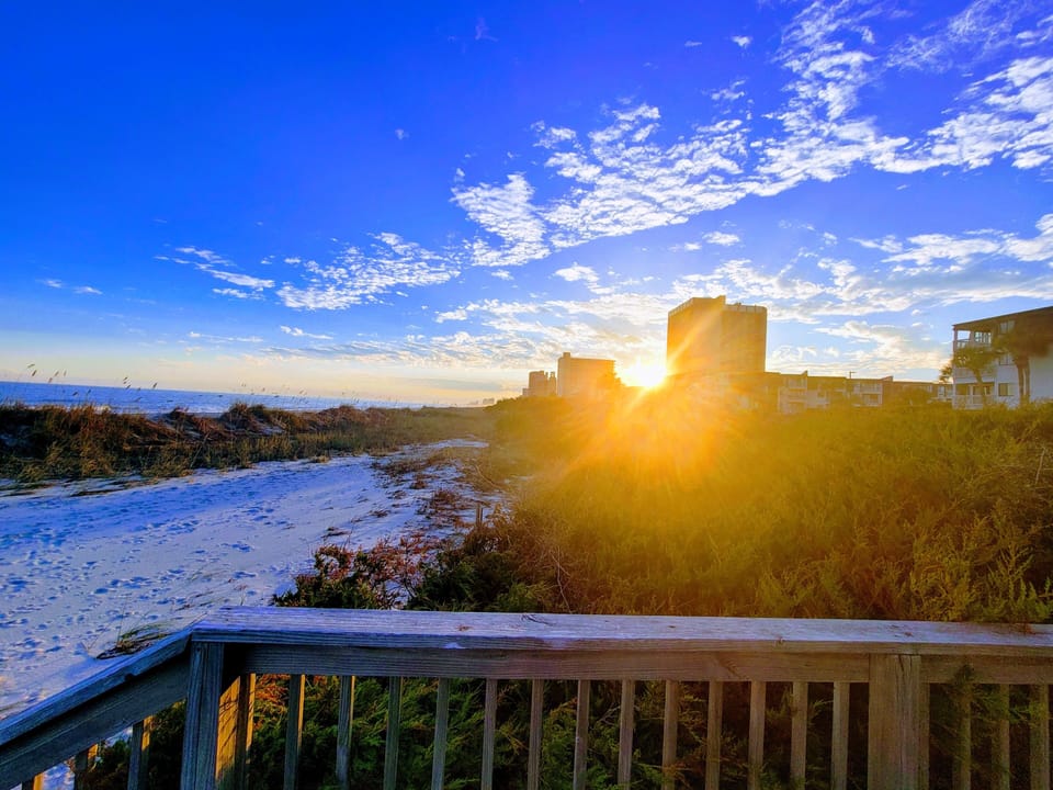 Sunset from private access stairwell Private is designated for OceanForestVillas