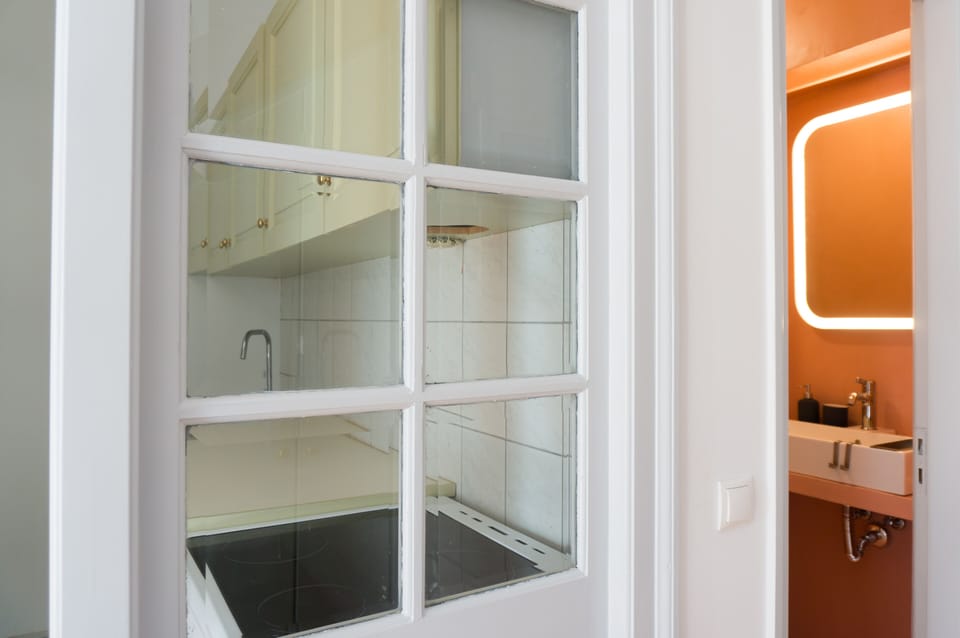Kitchen and bathroom from corridor