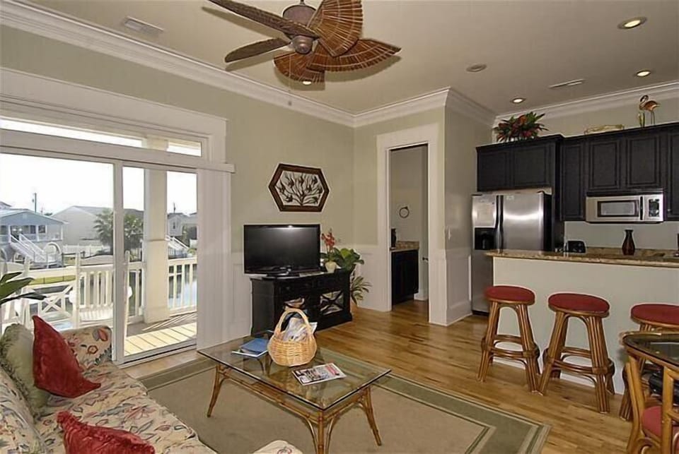 Entry Level Living Area with half bath, full size fridge, microwave, wet bar