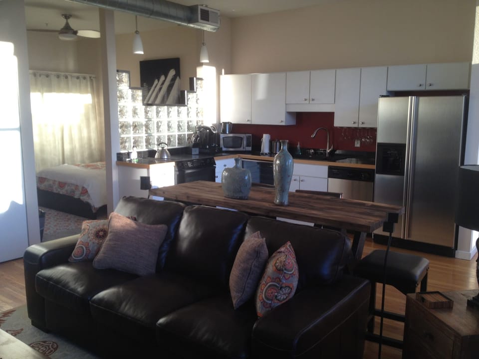 Kitchen with glass block includes multicolored fiber optic lighting
