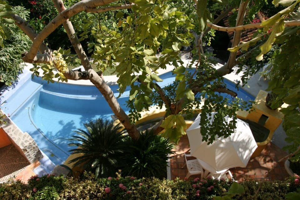 View of Pool from bedroom balcony Casa Alegre