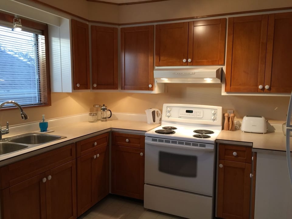 A fully equipped kitchen welcomes you.