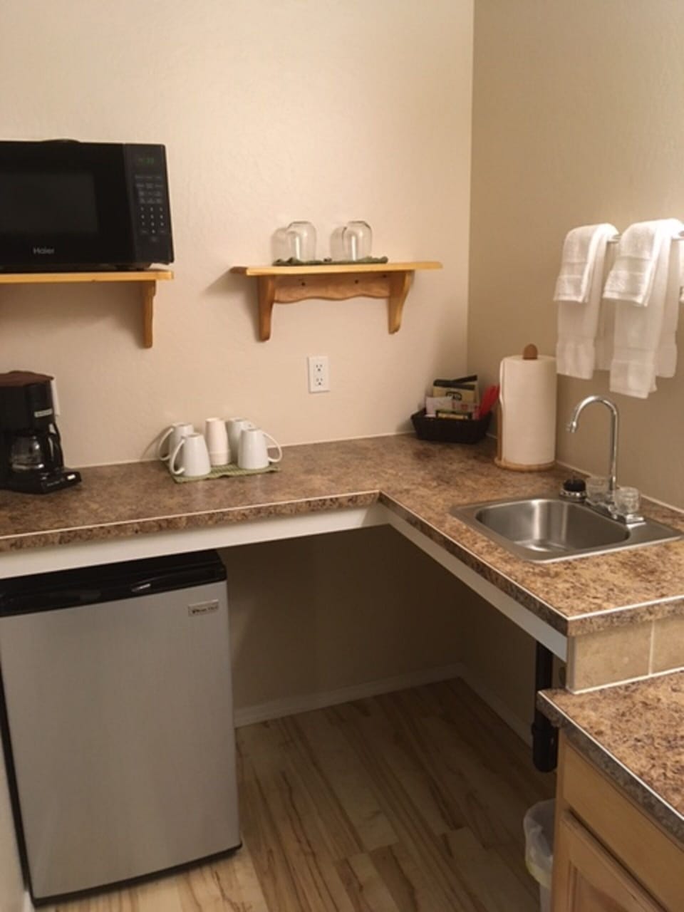 Microwave, mini fridge, coffee maker & bar sink
