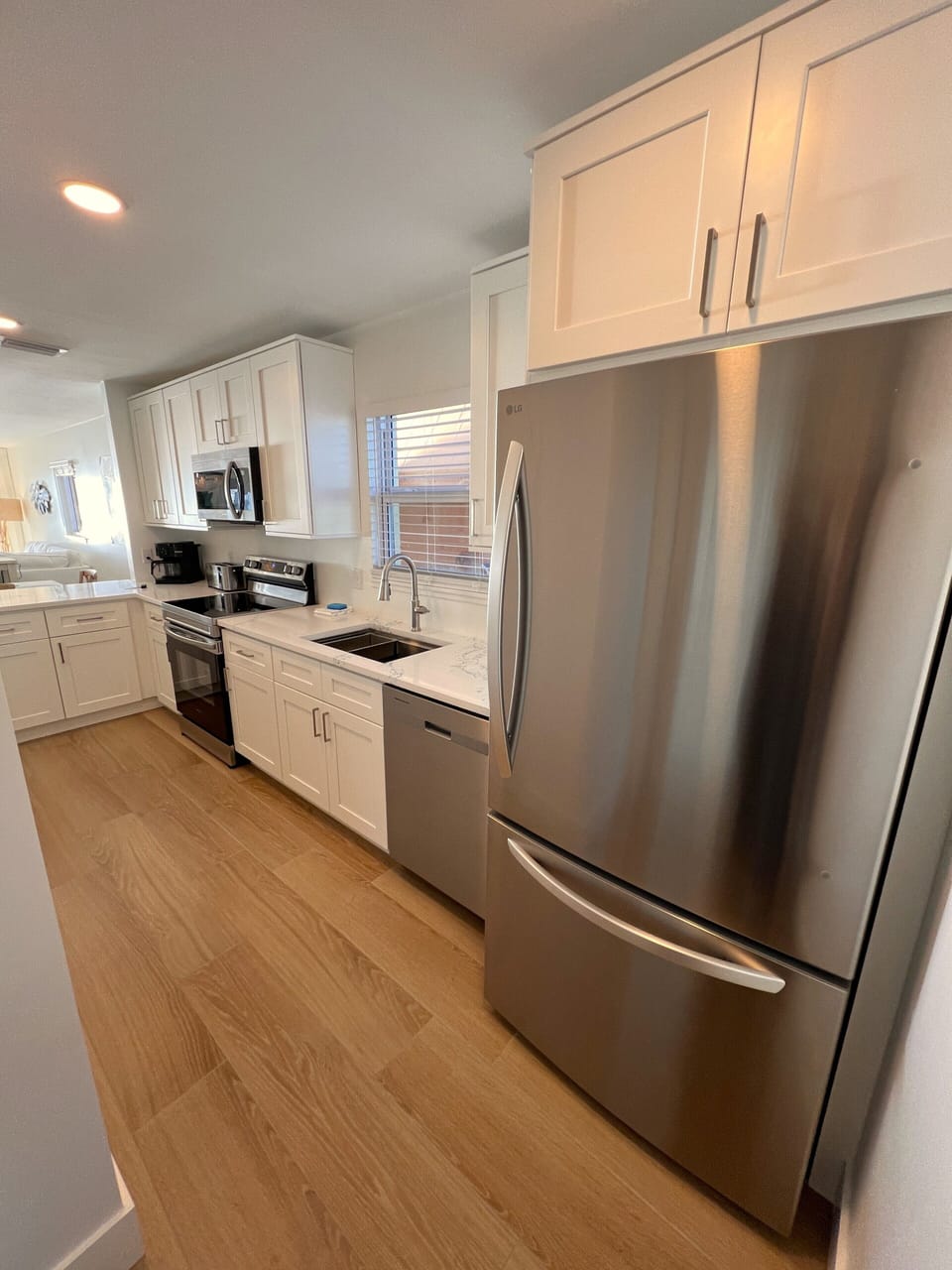 Upgraded appliances, custom cabinets with soft close drawers.
