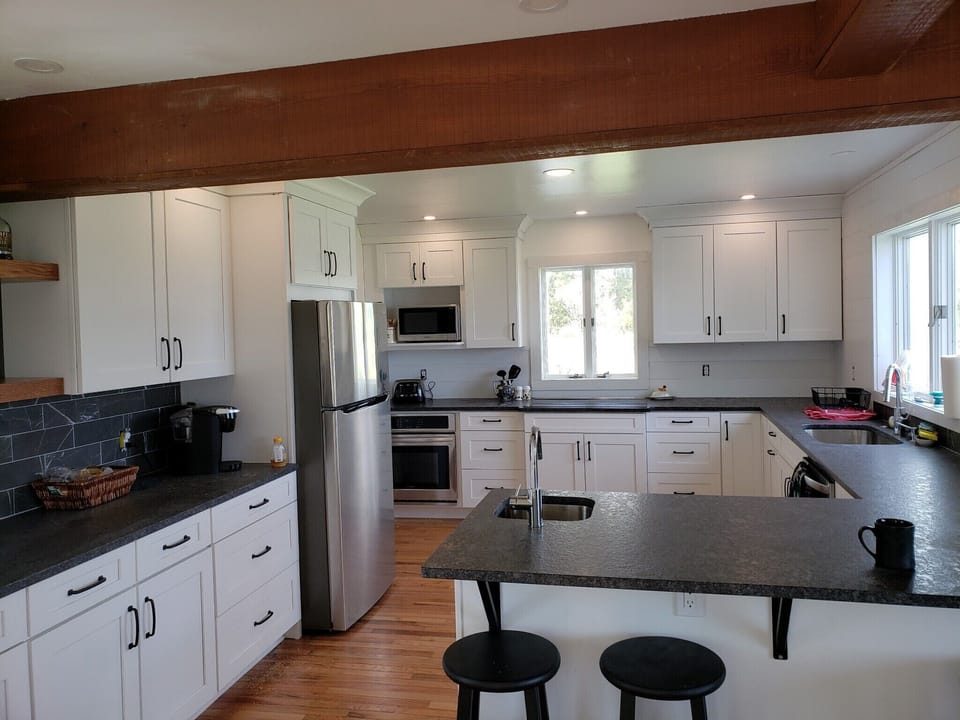 View of kitchen with new 5 burner Induction stove.