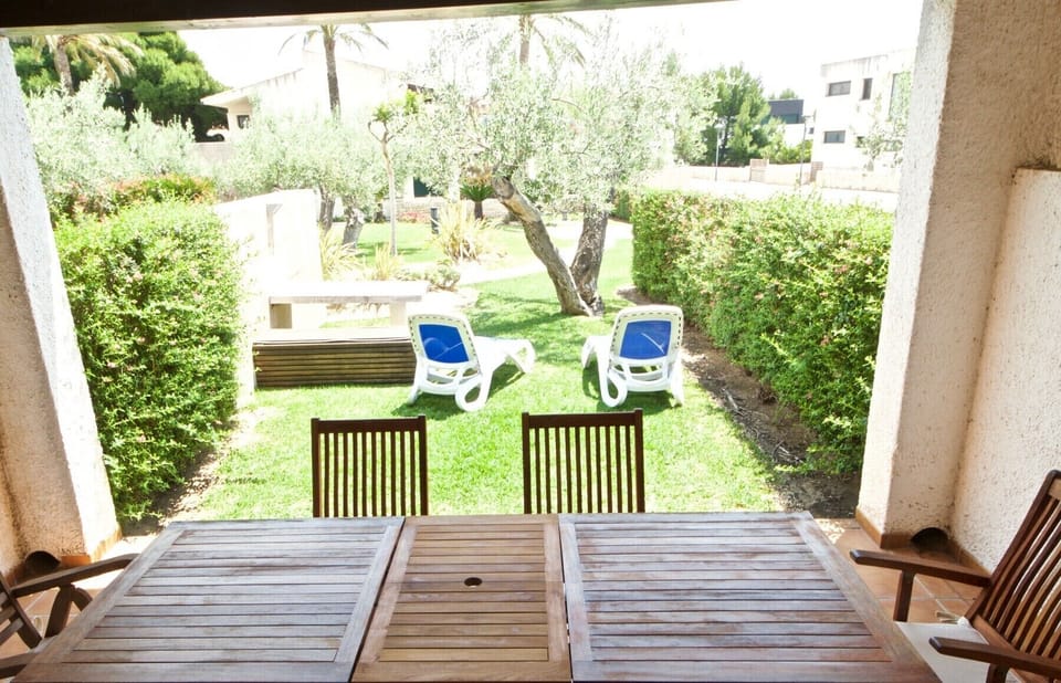 2. les-oliveres-resort-costa-dorada-tarragona-ampolla-l'ampolla-casa-2-exterior-terrace-garden-and-dining-area-spain-holiday-holidays-vacation