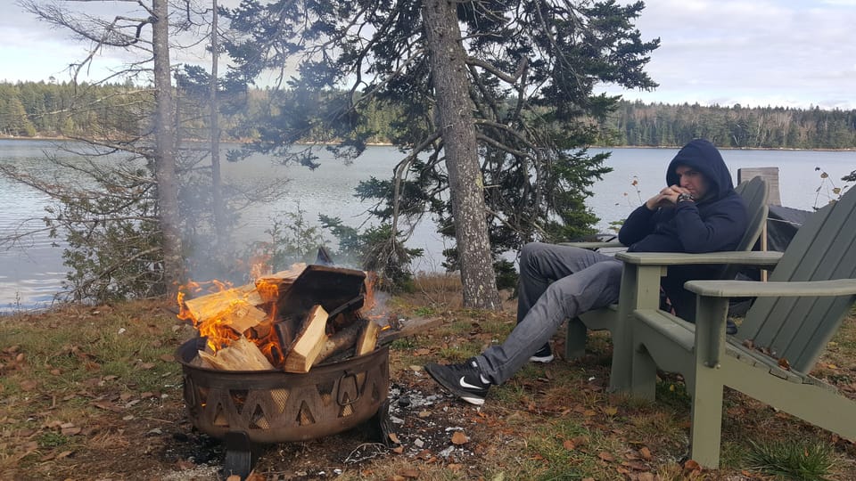 Fire Ring with Adirondack chairs and Picnic Table for outside dining.