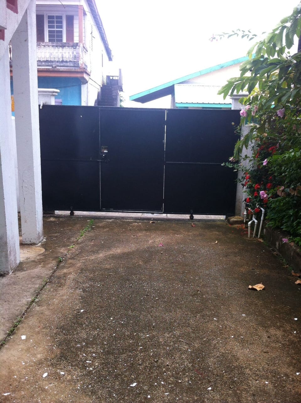 Vehicle/pedestrian gate to Front Street on South Side of property
