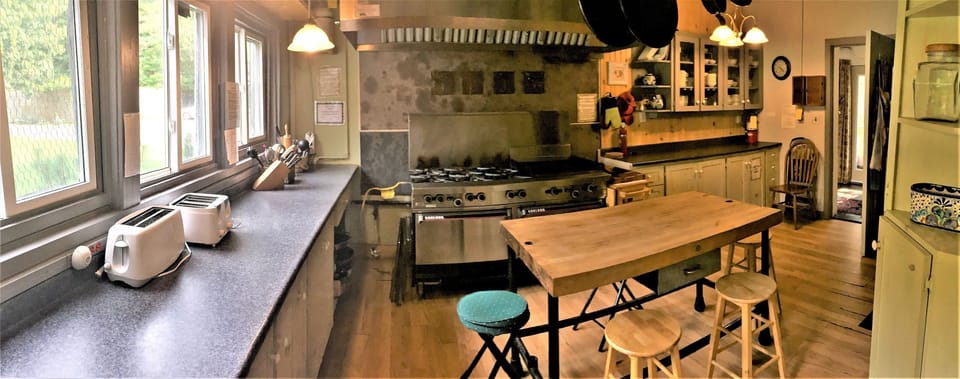 Another view of the kitchen with lots of counter space. 