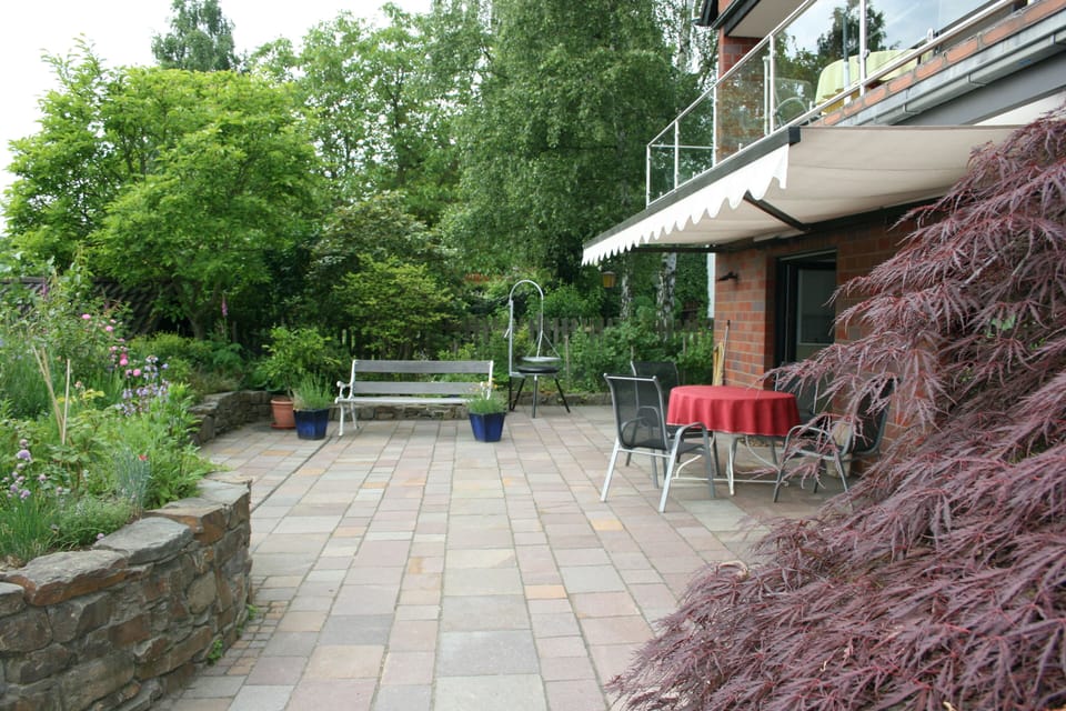 Terrace. Awning (canvas blind) halfway out