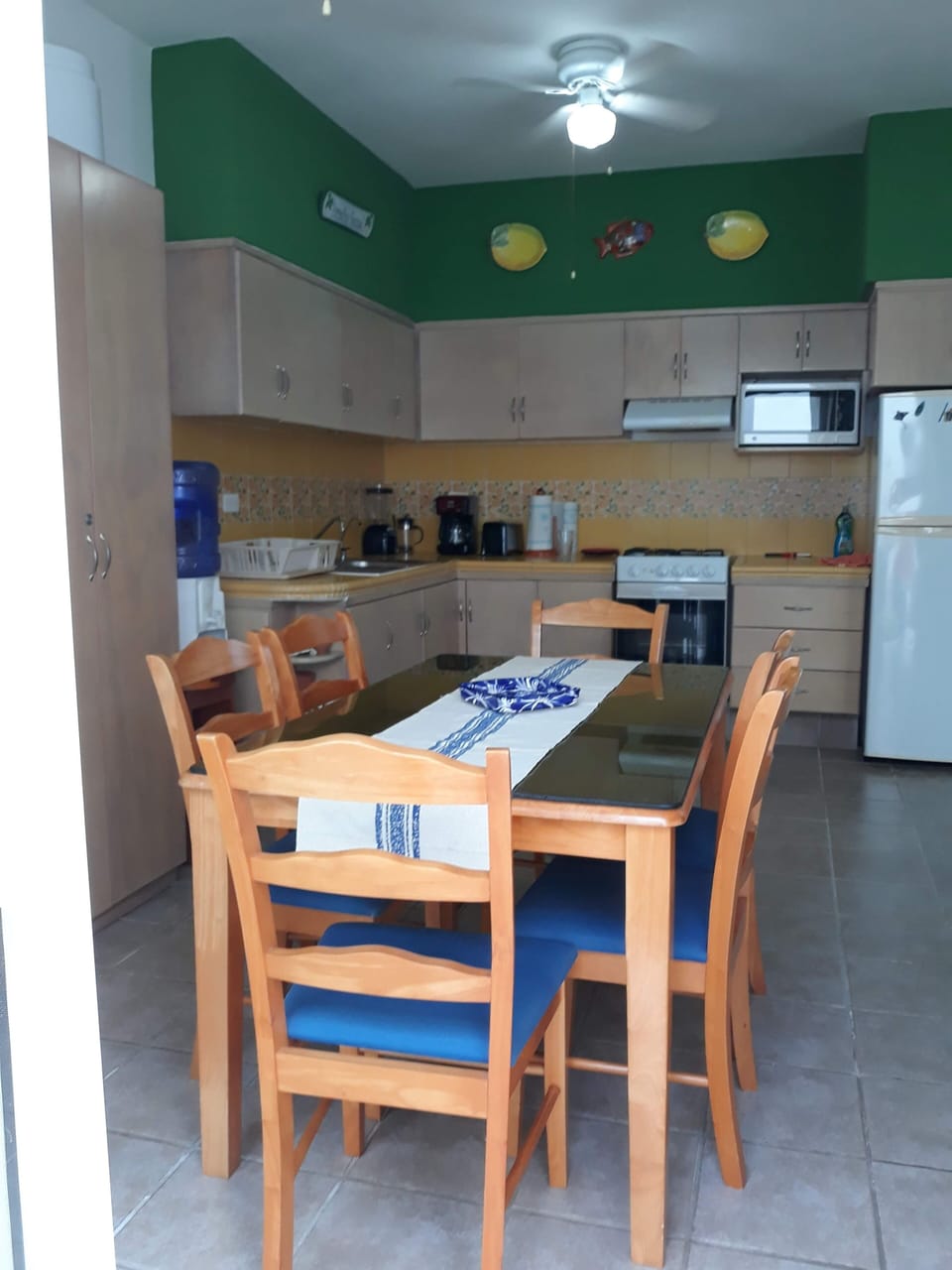 Fully-equipped kitchen and a dining room table that seats six