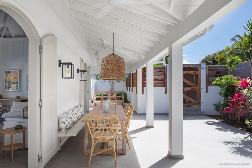 FRONT TERRACE WITH COVERED DINING