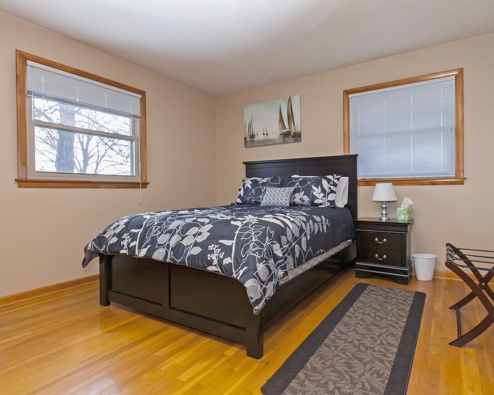 Master Bedroom with Queen Bed and half Bath. 