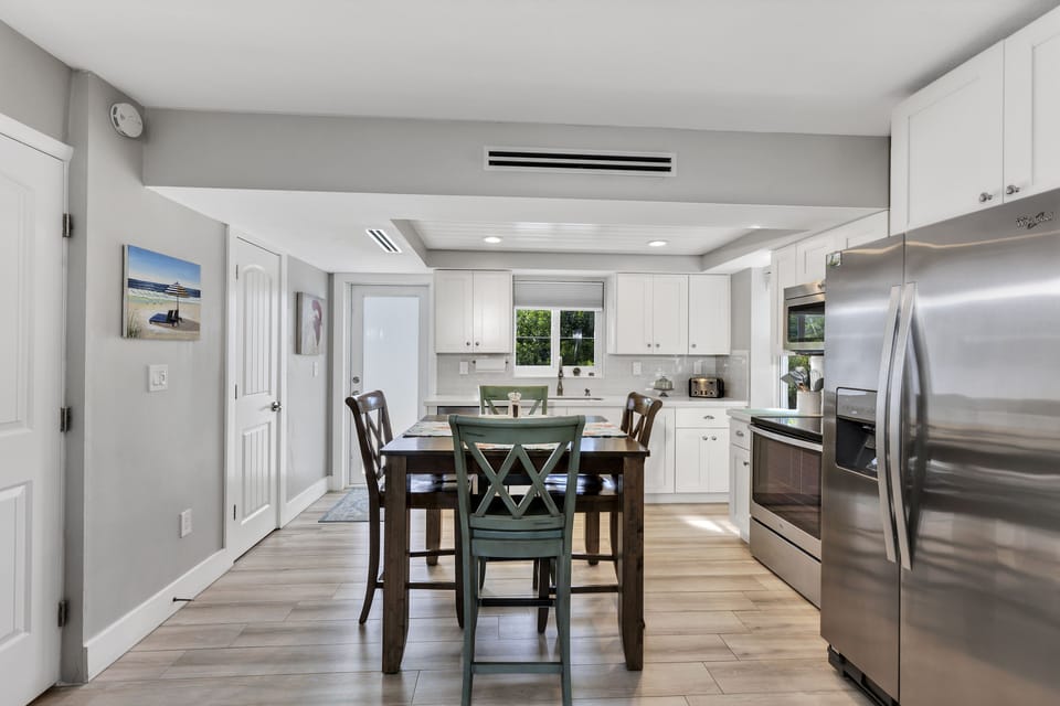 Open concept dining and main lounge area on 2nd floor.