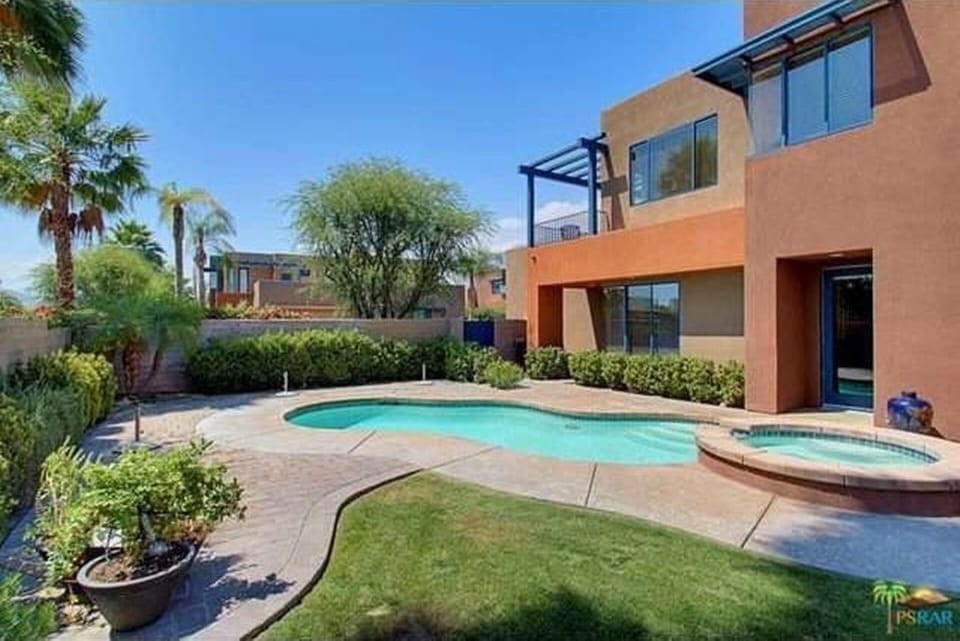 Large backyard with your own pool and hot tub 