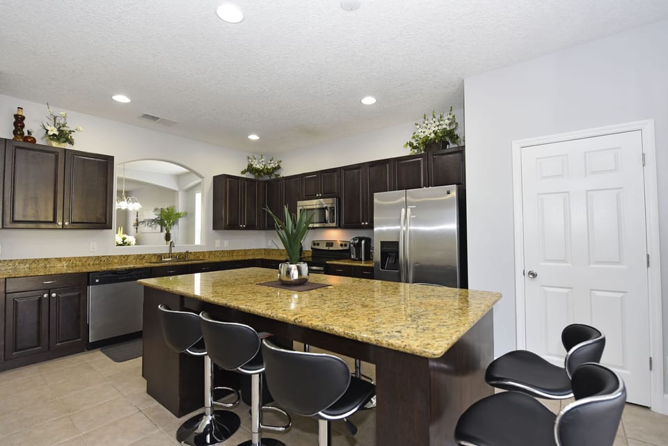 Kitchen plus seating for more guests to eat