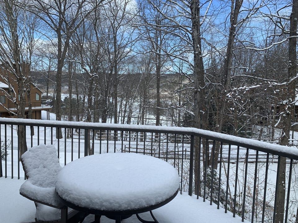Priavte deck with seasonal lake view
