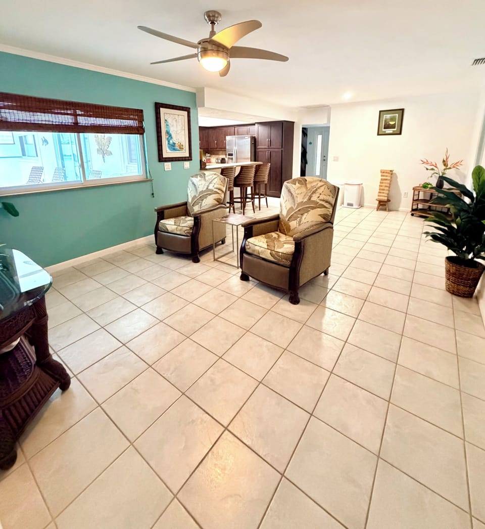 Second living area with tv and comfy recliners 