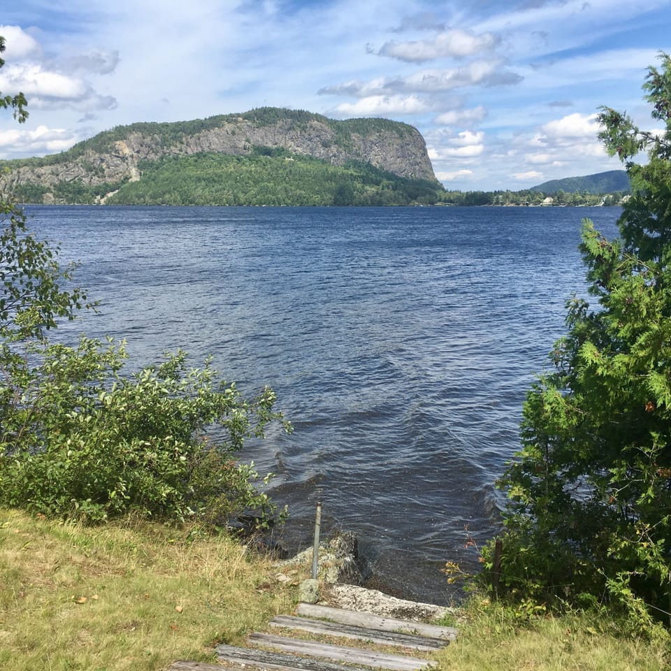 Adjacent property with point for swimming.