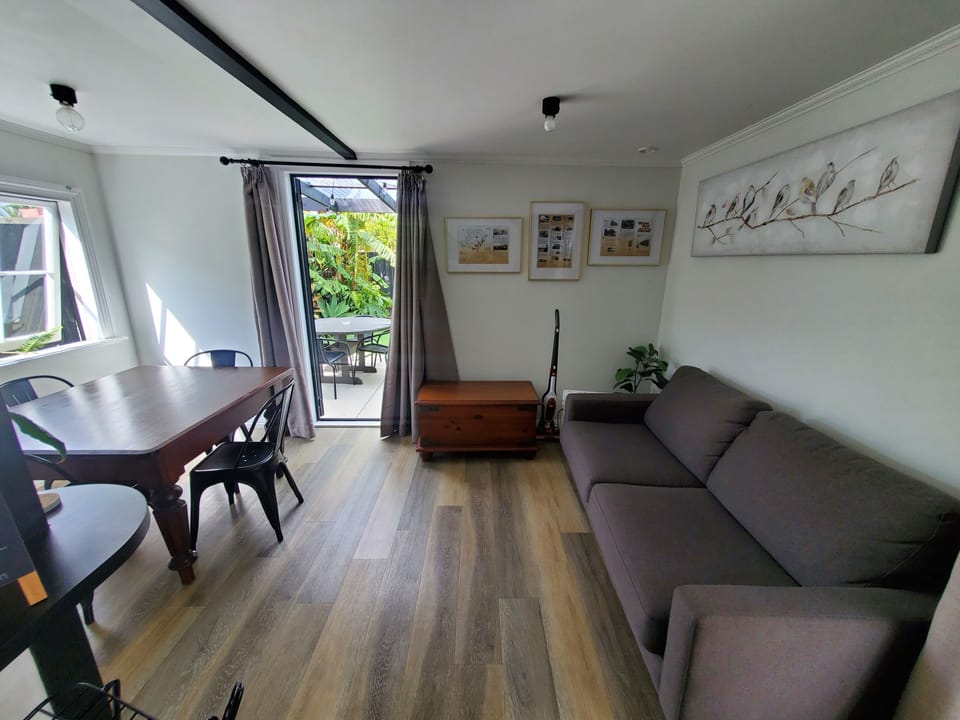 Dining and seating area (couch is a sofa bed for extra guests)