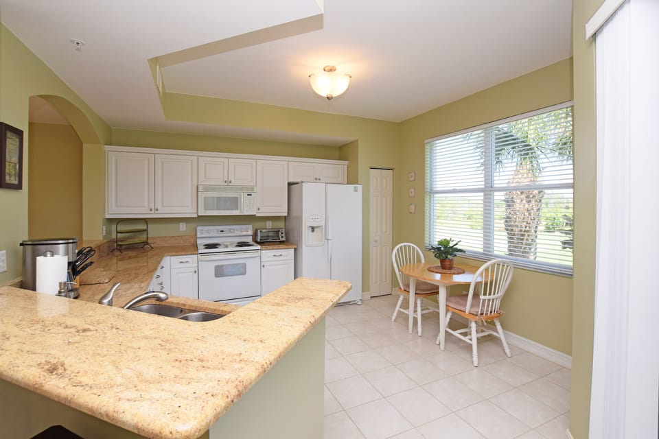 Breakfast nook with golf course views. 