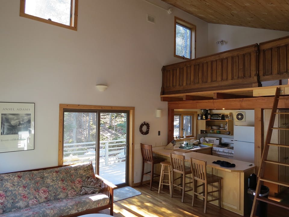Kitchen, loft, door to deck.