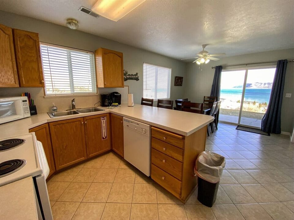 Open kitchen and dining area with stunning lake views