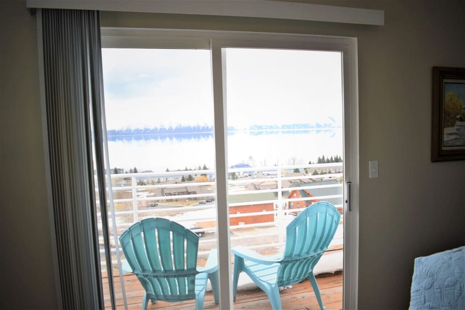 Wake up to scenic lake views from your private balcony