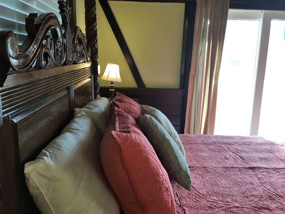 Queen Bedroom in Upper Level of Cottage pillow-view.