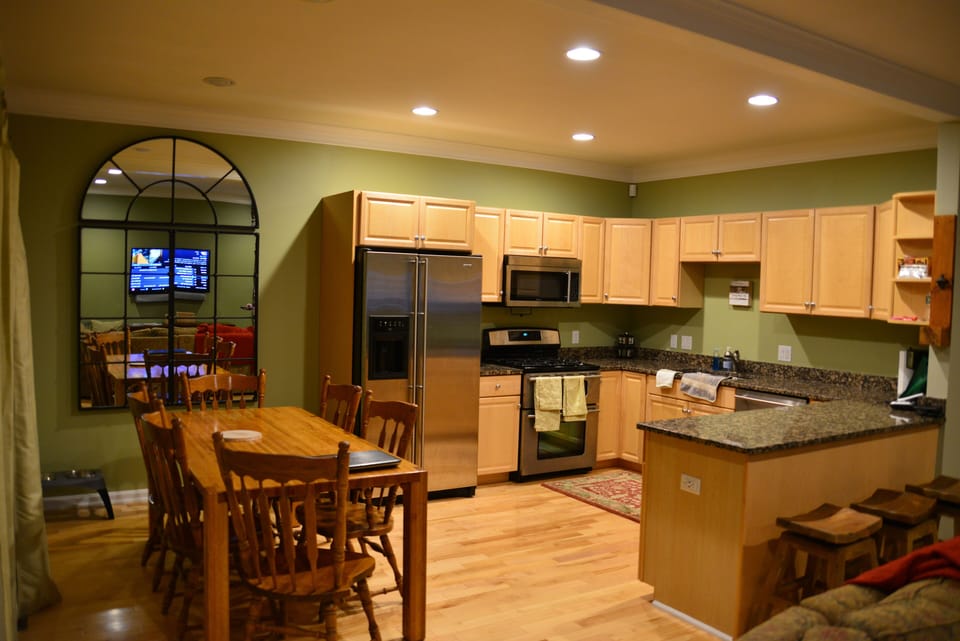 Kitchen (with old table), gas cooktop, double oven, 