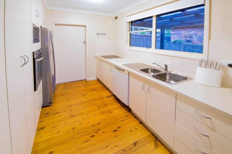 Fully equipped kitchen with plenty of kitchenware, crockery and cutlery 