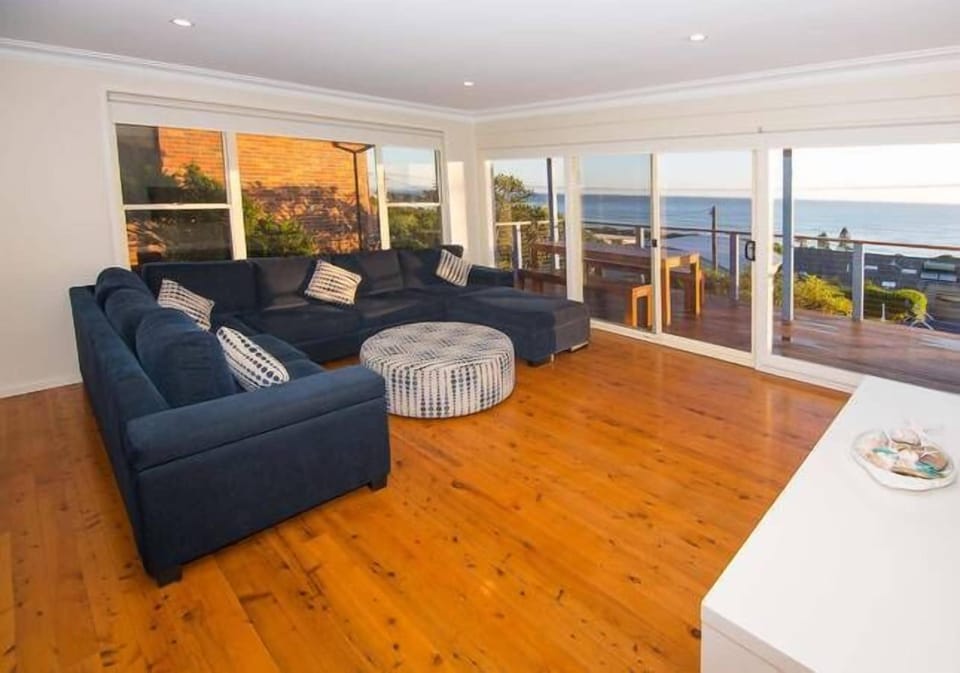 Living area offers panoramic views,ducted AC and a 75" Smart TV for movie nights