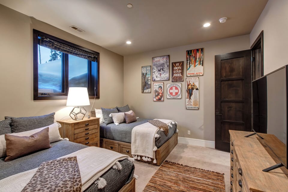 Bedroom 4 with Two Double Beds and a Smart TV