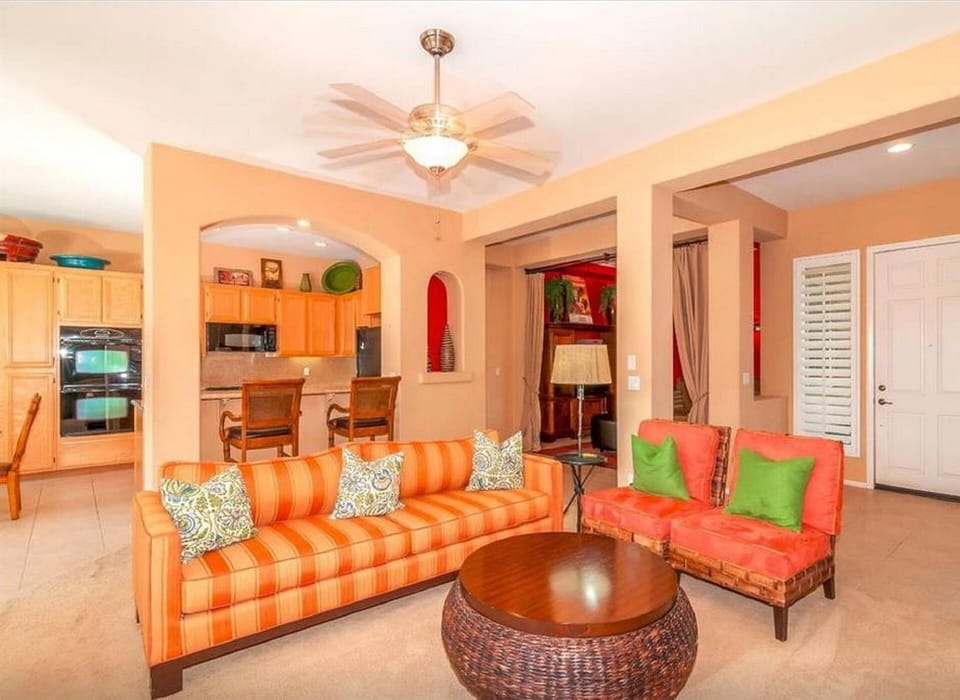 The living room is appointed with professional decor. 
