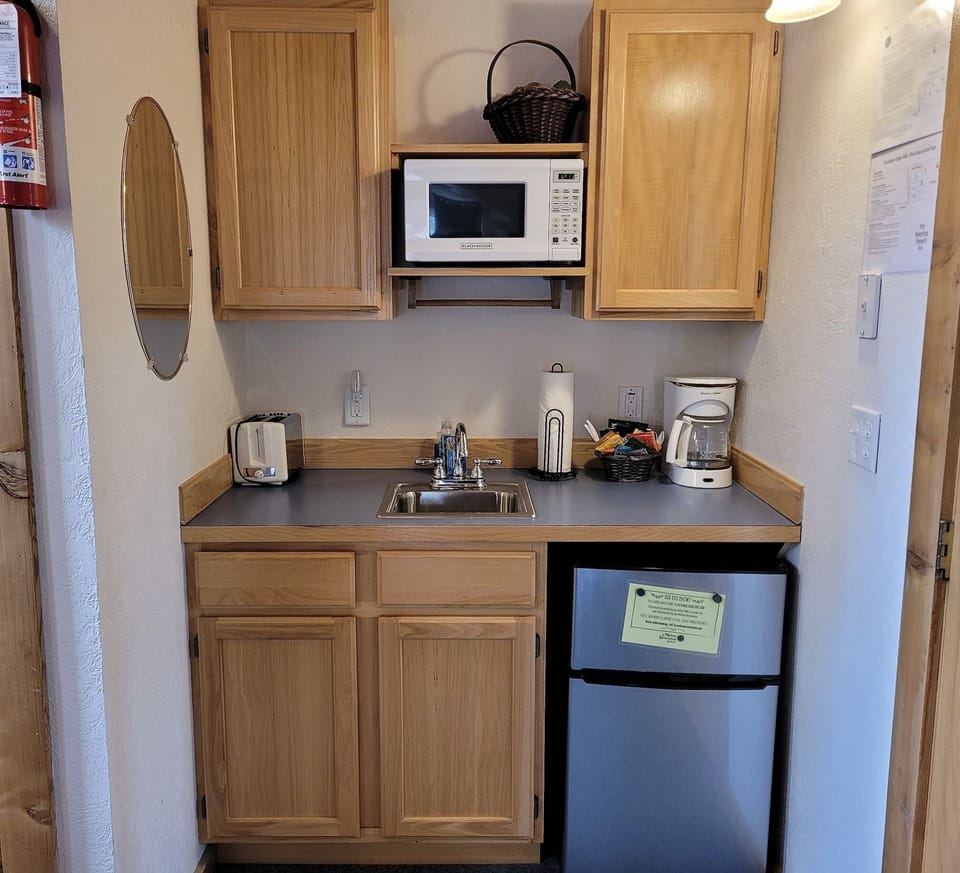 The upstairs bedroom also has a small kitchenette.