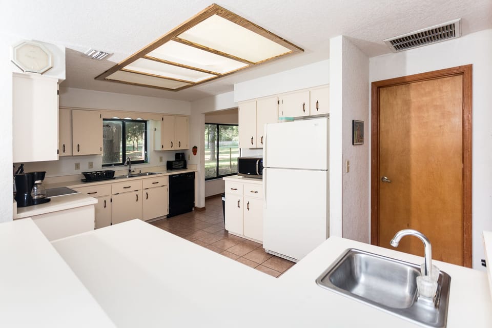 Kitchen includes oven with range, fridge, double sink, dishwasher and more!
