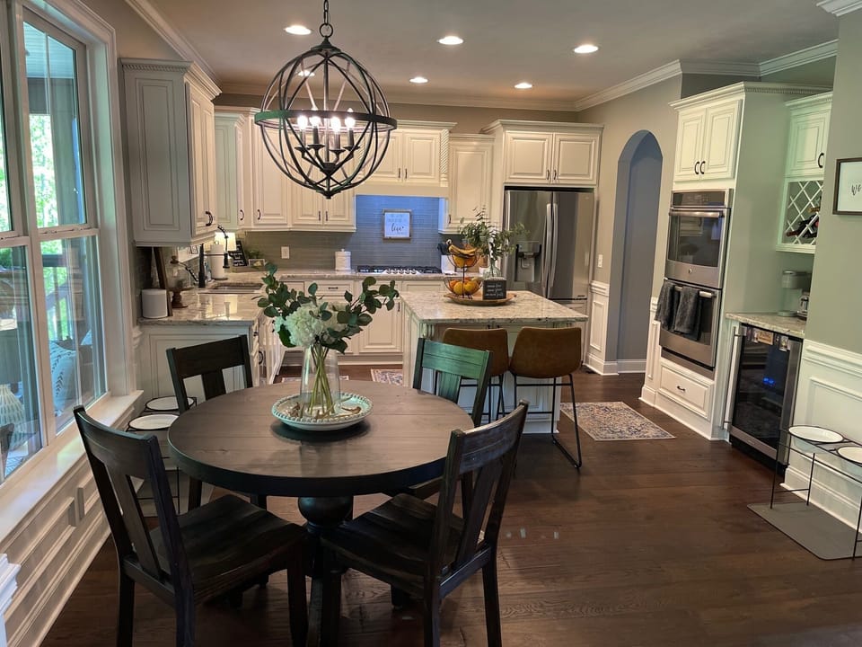 Gourmet custom kitchen with dinette table 