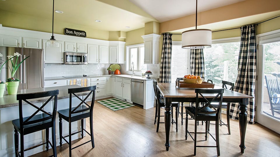 Lots of seating in the bright kitchen.
