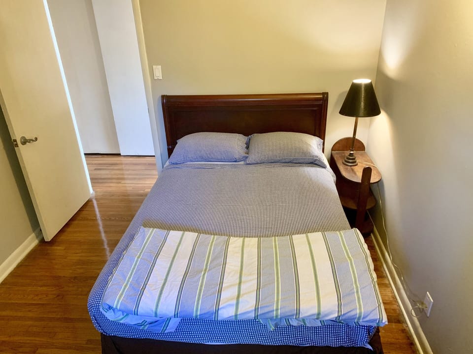 First bedroom with a full bed.