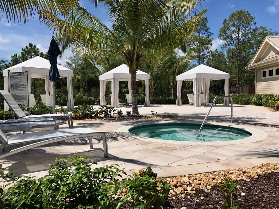Community hot tub, sand area with cabanas