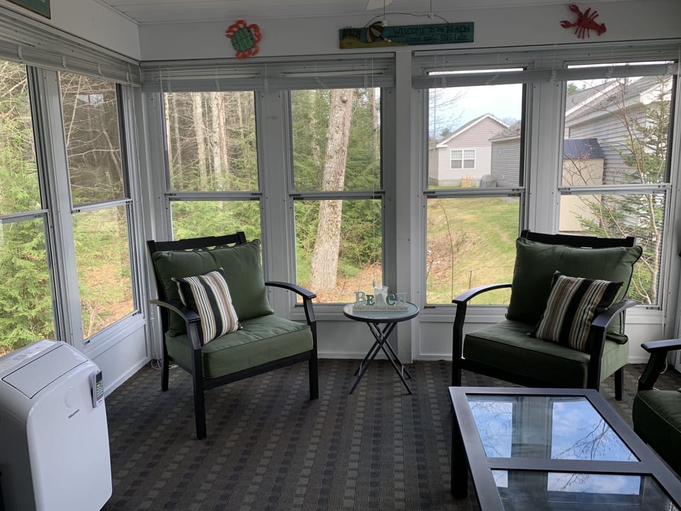 Three Season Porch overlooking private wooded area
